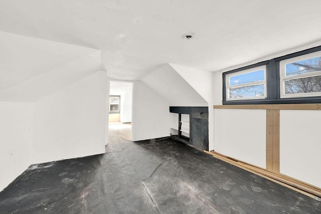 bonus room featuring vaulted ceiling