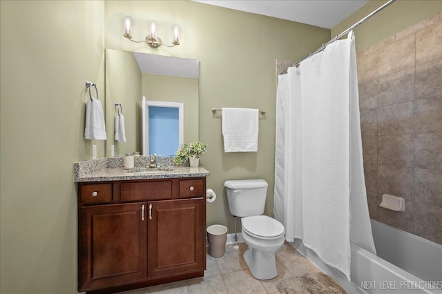 full bathroom featuring tile patterned floors, vanity, toilet, and shower / bath combo with shower curtain