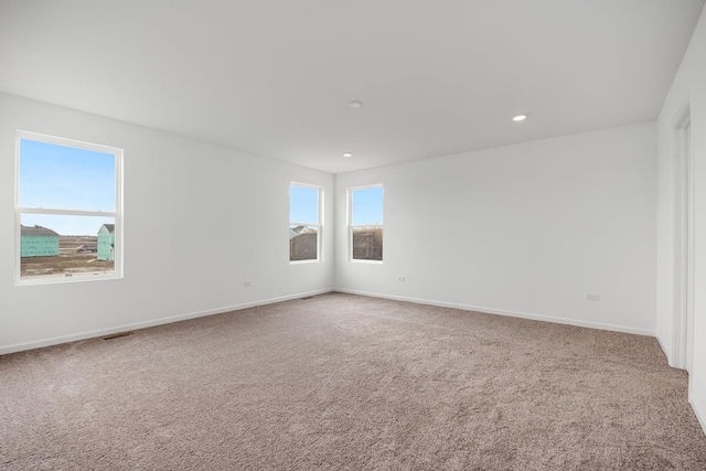 spare room with carpet flooring