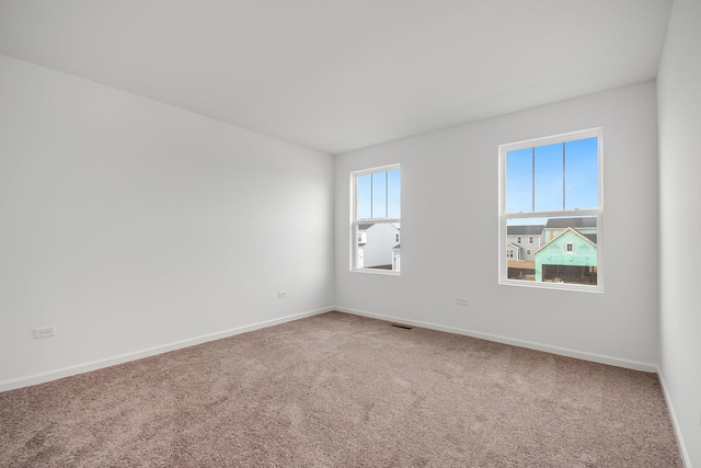 spare room with carpet flooring