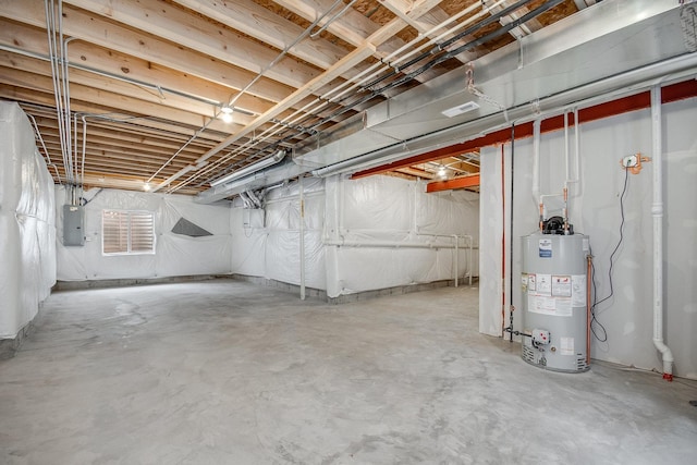 basement with electric panel and gas water heater