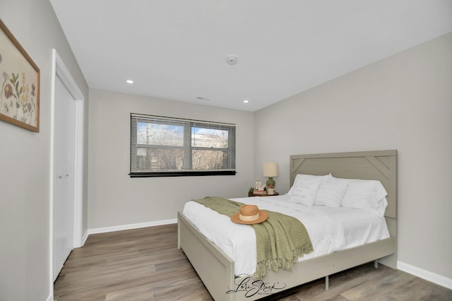 bedroom featuring hardwood / wood-style flooring