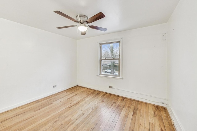 unfurnished room featuring ceiling fan and light hardwood / wood-style floors