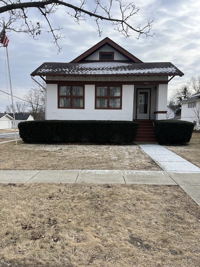 bungalow-style home featuring covered porch