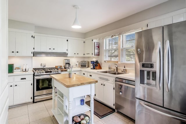 201 W Council Trl, Mount Prospect, IL 60056 - kitchen with open shelves, butcher block counters, extractor fan, a sink, and stainless steel appliances