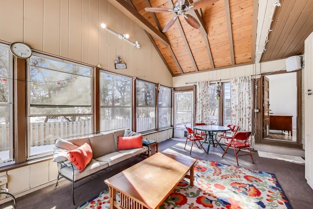 sunroom / solarium featuring vaulted ceiling with beams, wood ceiling, and ceiling fan