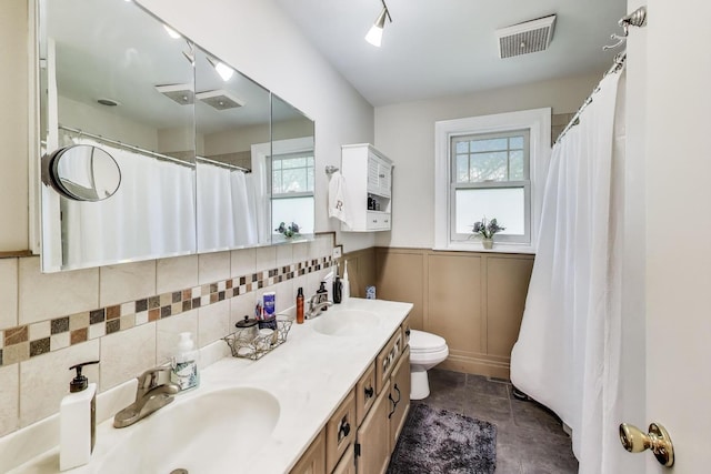 201 W Council Trl, Mount Prospect, IL 60056 - bathroom with visible vents, a healthy amount of sunlight, and a sink