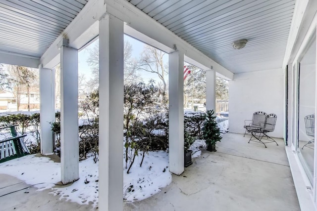 view of snow covered patio