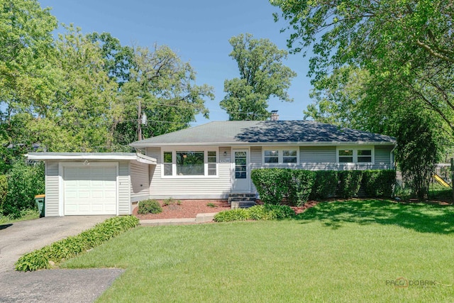 single story home with a garage and a front lawn