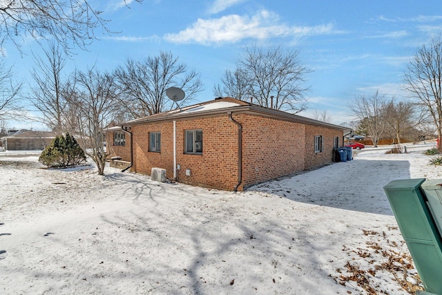 view of snow covered property