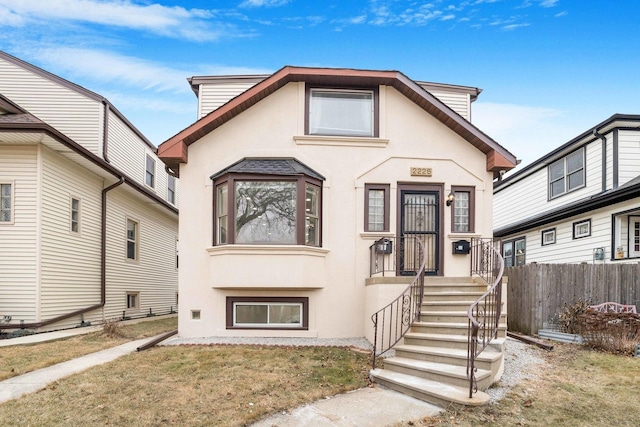 view of front of home with a front yard