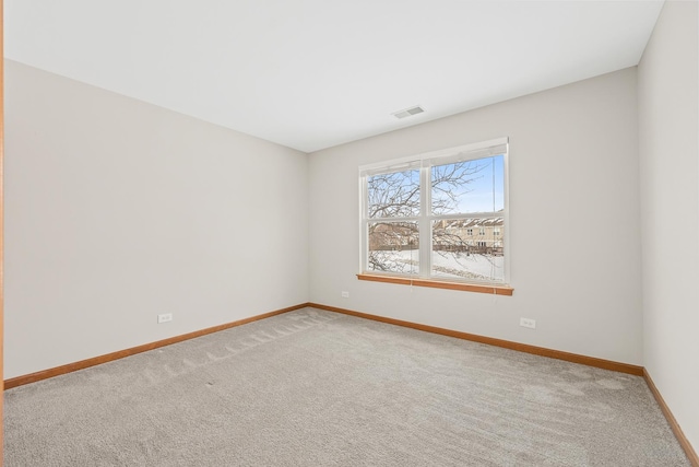 view of carpeted spare room