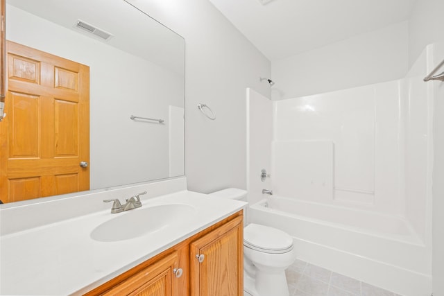 full bathroom featuring vanity, tile patterned flooring, toilet, and bathtub / shower combination