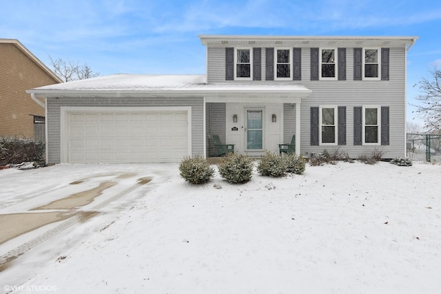 view of front of property featuring a garage