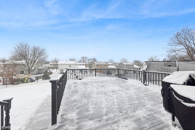 view of snow covered deck