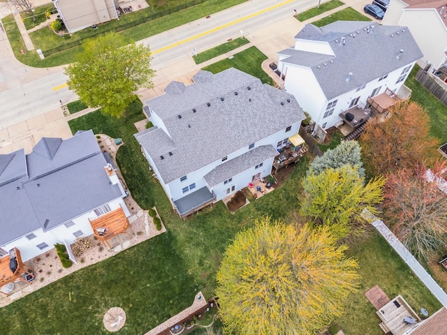 birds eye view of property with a residential view