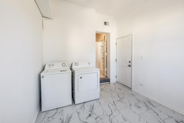 laundry area featuring separate washer and dryer