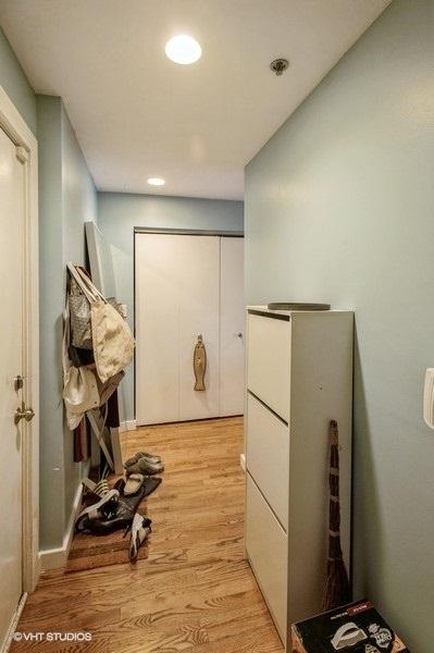 corridor featuring light wood-type flooring