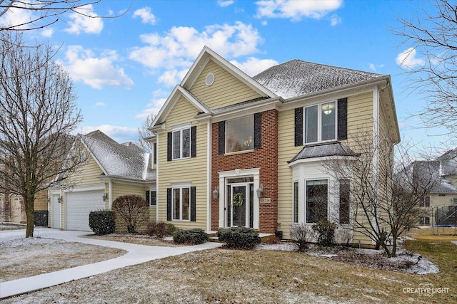 view of front of home with a garage