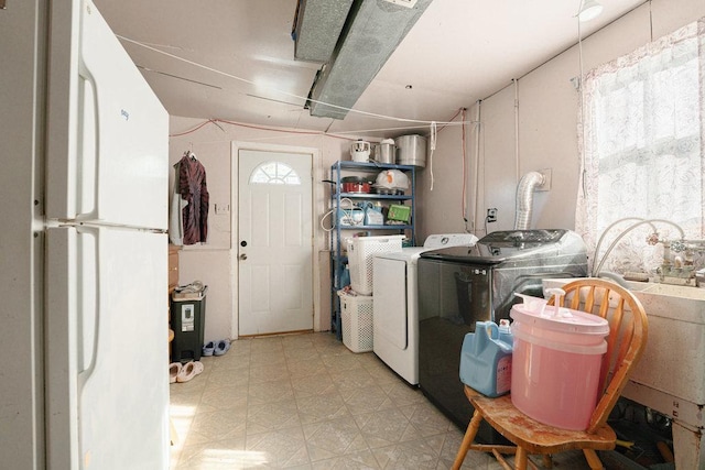 laundry room with washer and clothes dryer