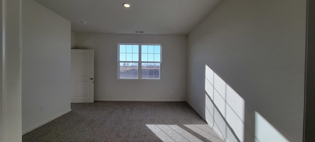 view of carpeted spare room