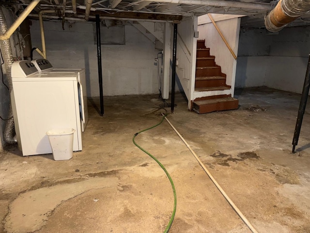 basement with washer and clothes dryer