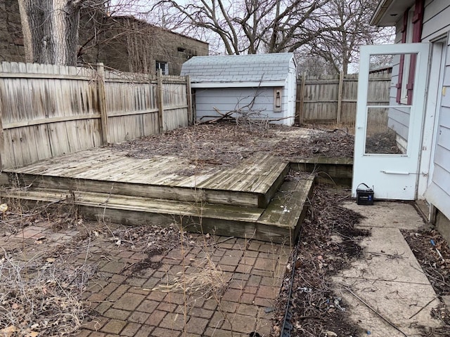 wooden deck featuring an outdoor structure