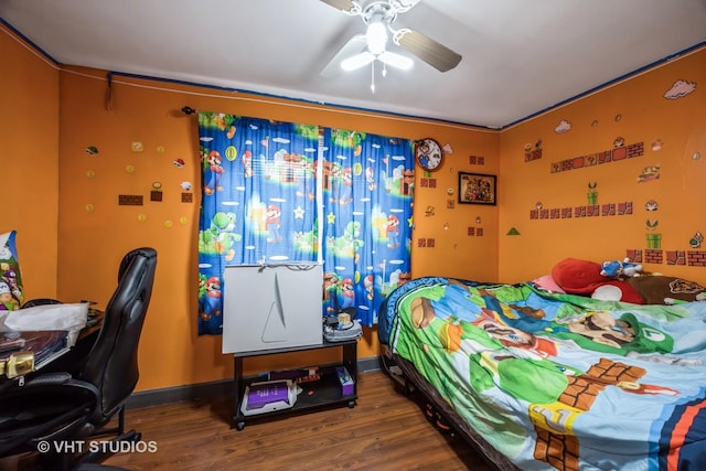 bedroom with hardwood / wood-style floors and ceiling fan