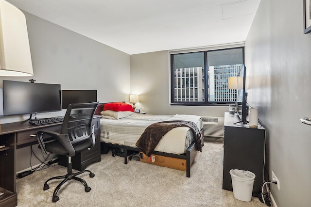 bedroom with light carpet