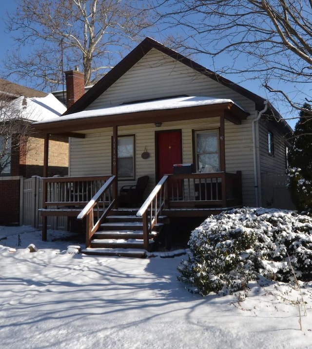 bungalow featuring covered porch