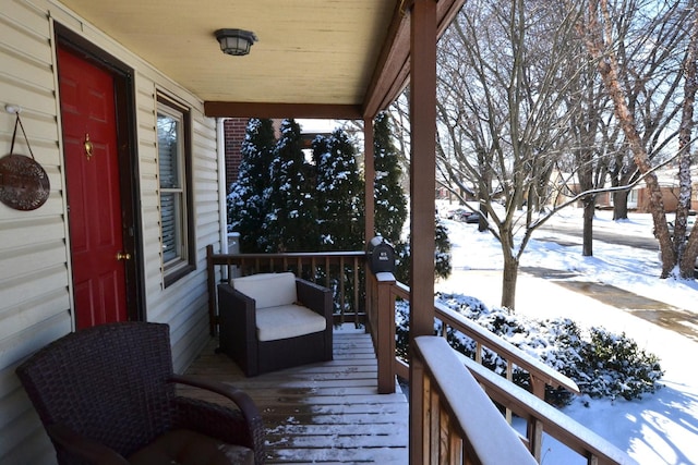 view of snow covered deck