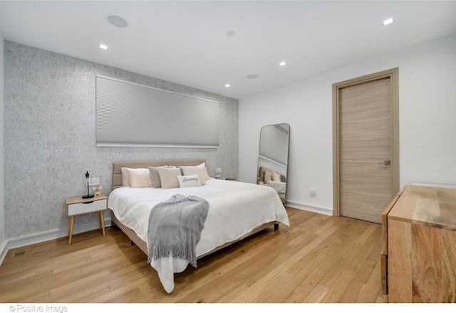 bedroom featuring light hardwood / wood-style flooring