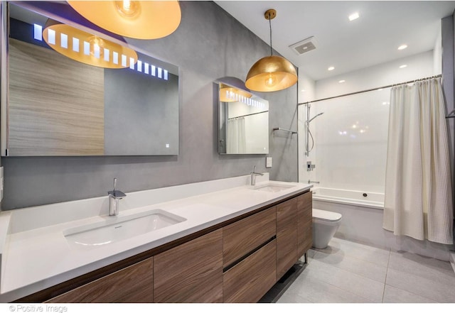 full bathroom with tile patterned flooring, vanity, toilet, and shower / bath combo