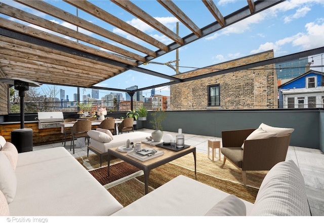 view of patio featuring an outdoor living space, area for grilling, and a pergola