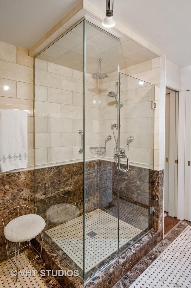 bathroom with an enclosed shower