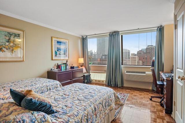 bedroom featuring light parquet floors, crown molding, and an AC wall unit