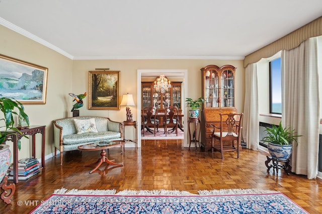 living area featuring a notable chandelier, crown molding, and parquet flooring