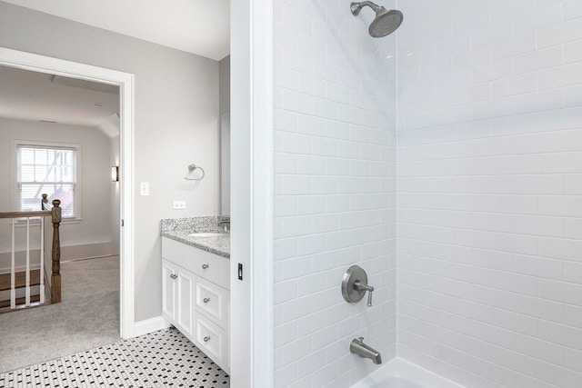 full bath featuring shower / washtub combination, vanity, and baseboards