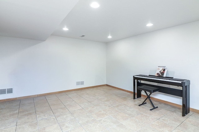 interior space featuring recessed lighting, visible vents, and baseboards