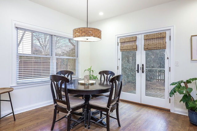 dining room featuring recessed lighting, baseboards, dark wood-type flooring, and french doors