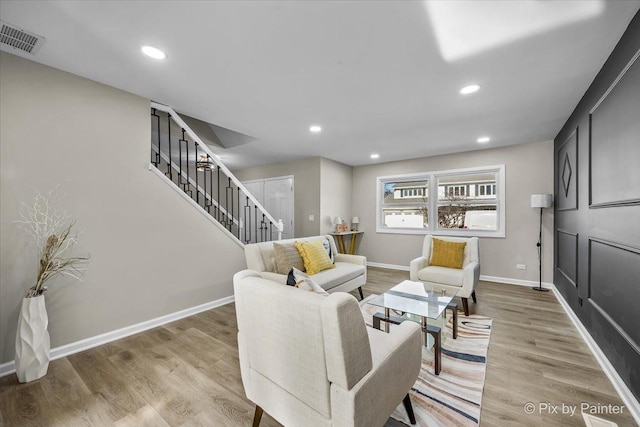 living room with hardwood / wood-style floors