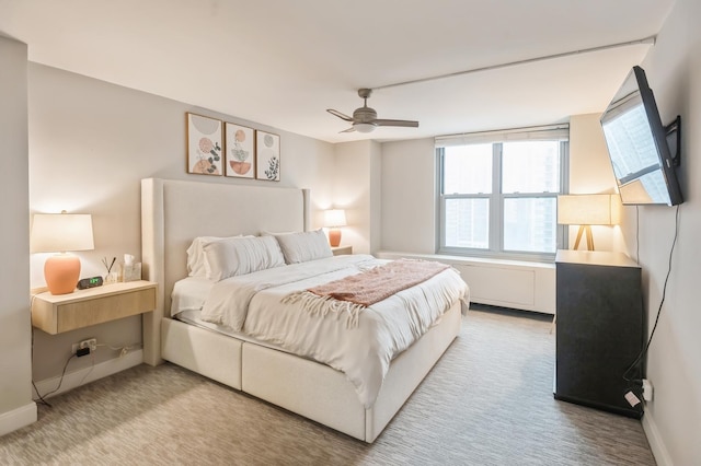 400 E Randolph St Unit 2410, Chicago, IL 60601 - bedroom with light carpet, ceiling fan, and baseboards