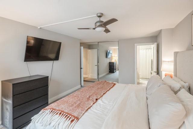 400 E Randolph St Unit 2410, Chicago, IL 60601 - carpeted bedroom with baseboards, ceiling fan, and ensuite bathroom