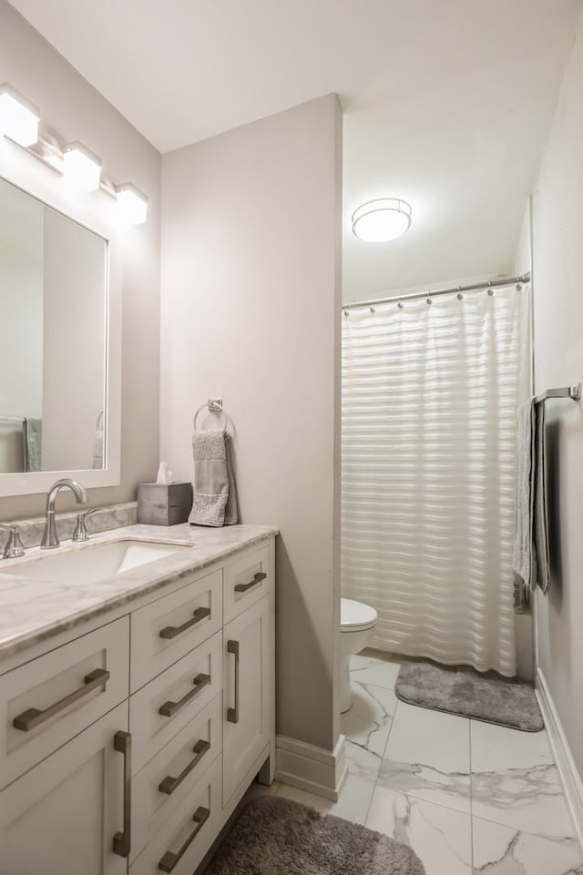 400 E Randolph St Unit 2410, Chicago, IL 60601 - bathroom featuring marble finish flooring, vanity, baseboards, toilet, and curtained shower