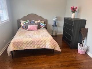 bedroom featuring dark hardwood / wood-style floors