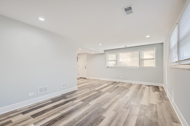 unfurnished room featuring light hardwood / wood-style floors