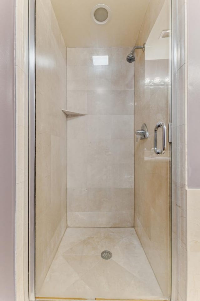 bathroom featuring walk in shower