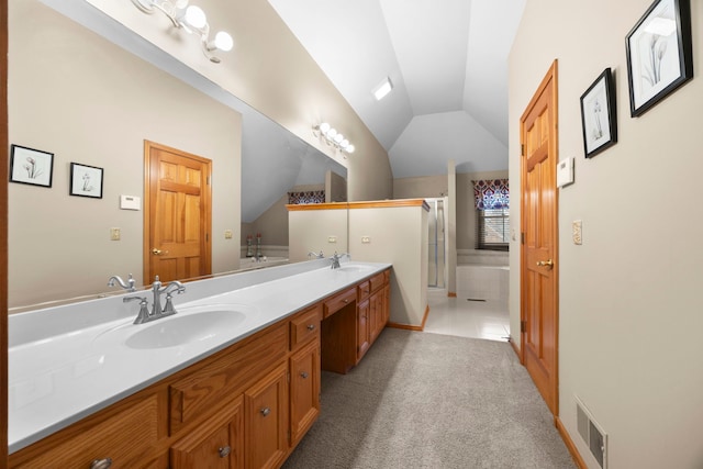 bathroom with visible vents, a shower stall, lofted ceiling, double vanity, and a sink