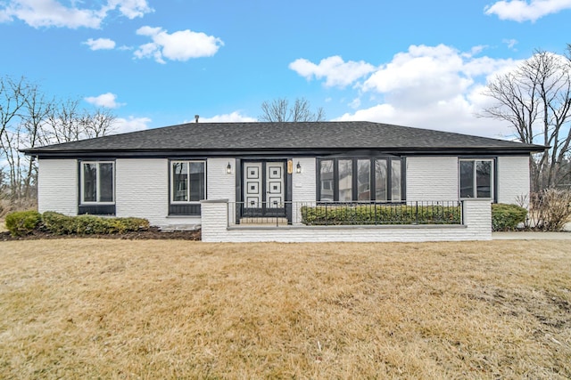 view of front of home with a front yard