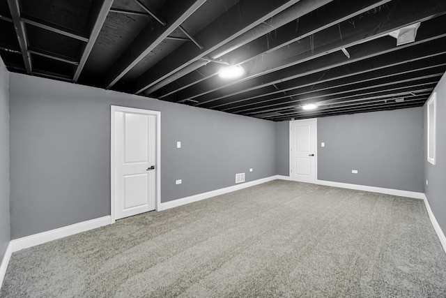 basement featuring carpet flooring